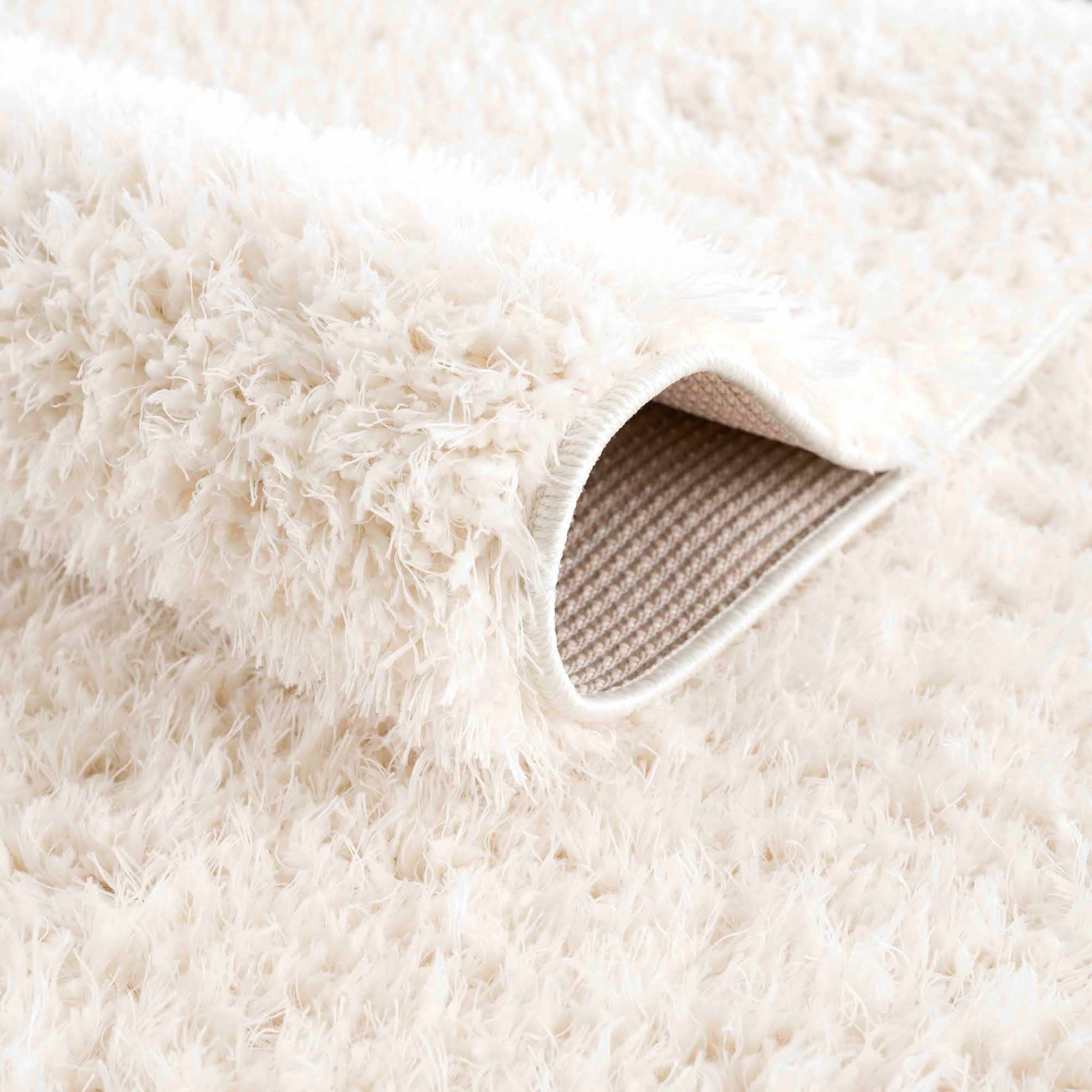 Faina Solid Cream Shag 7ft Rug Washable