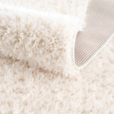 Faina Solid Cream Shag 7ft Rug Washable