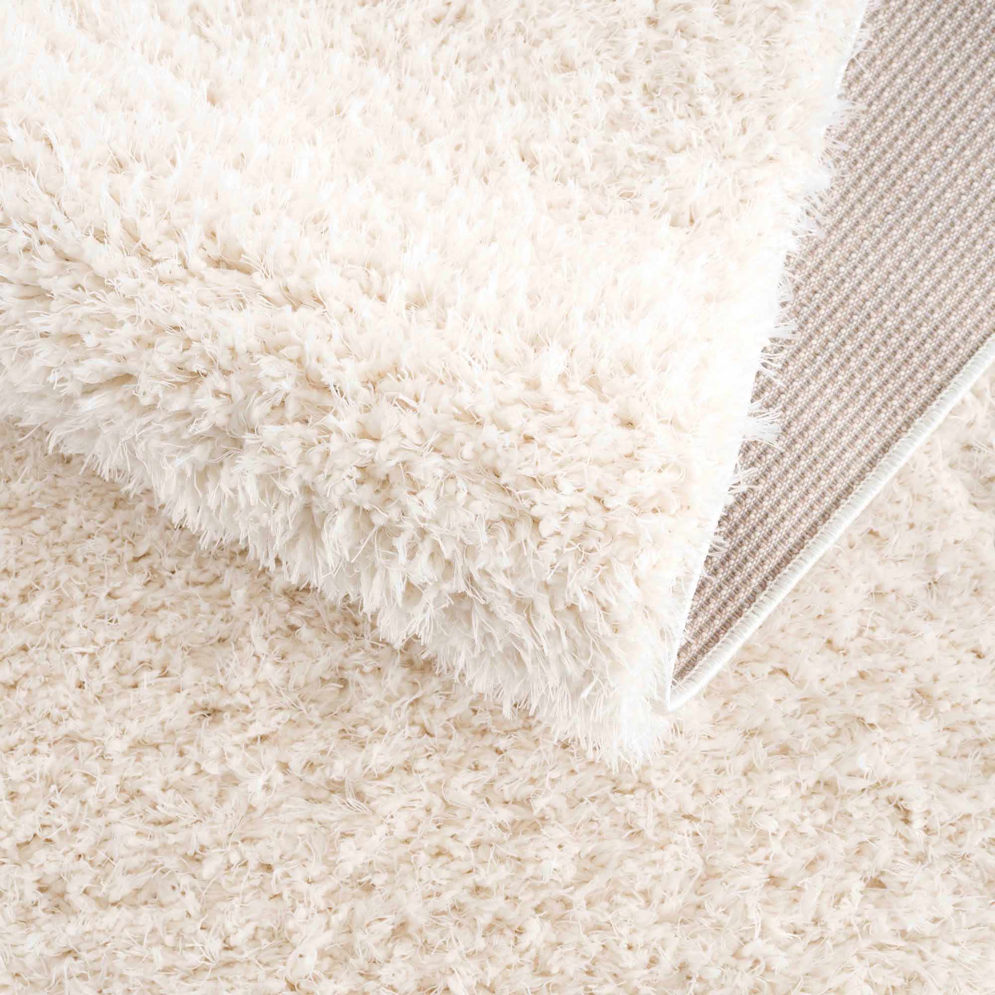 Faina Solid Cream Shag 7ft Rug Washable