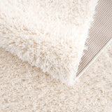 Faina Solid Cream Shag 7ft Rug Washable