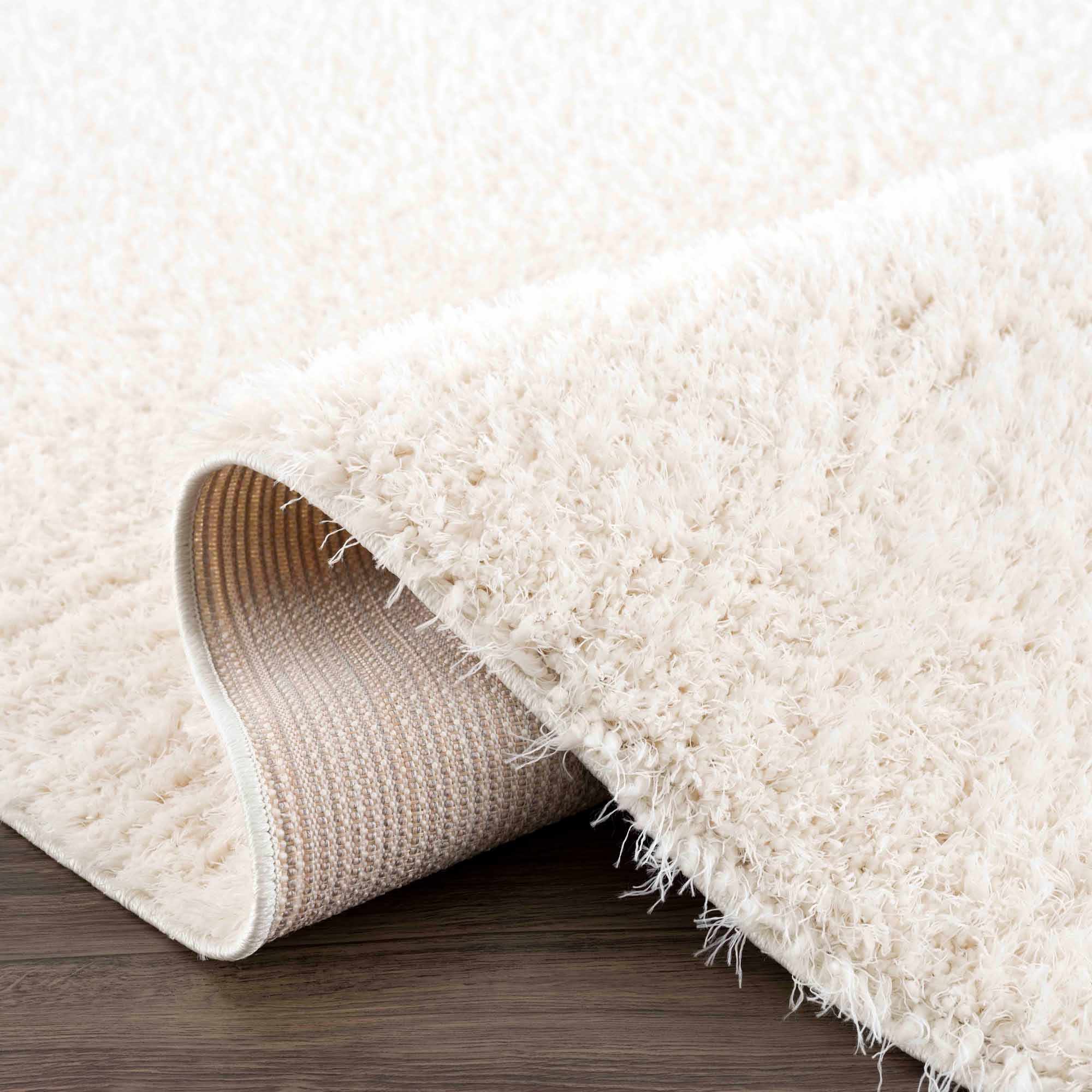 Faina Solid Cream Shag 7ft Rug Washable