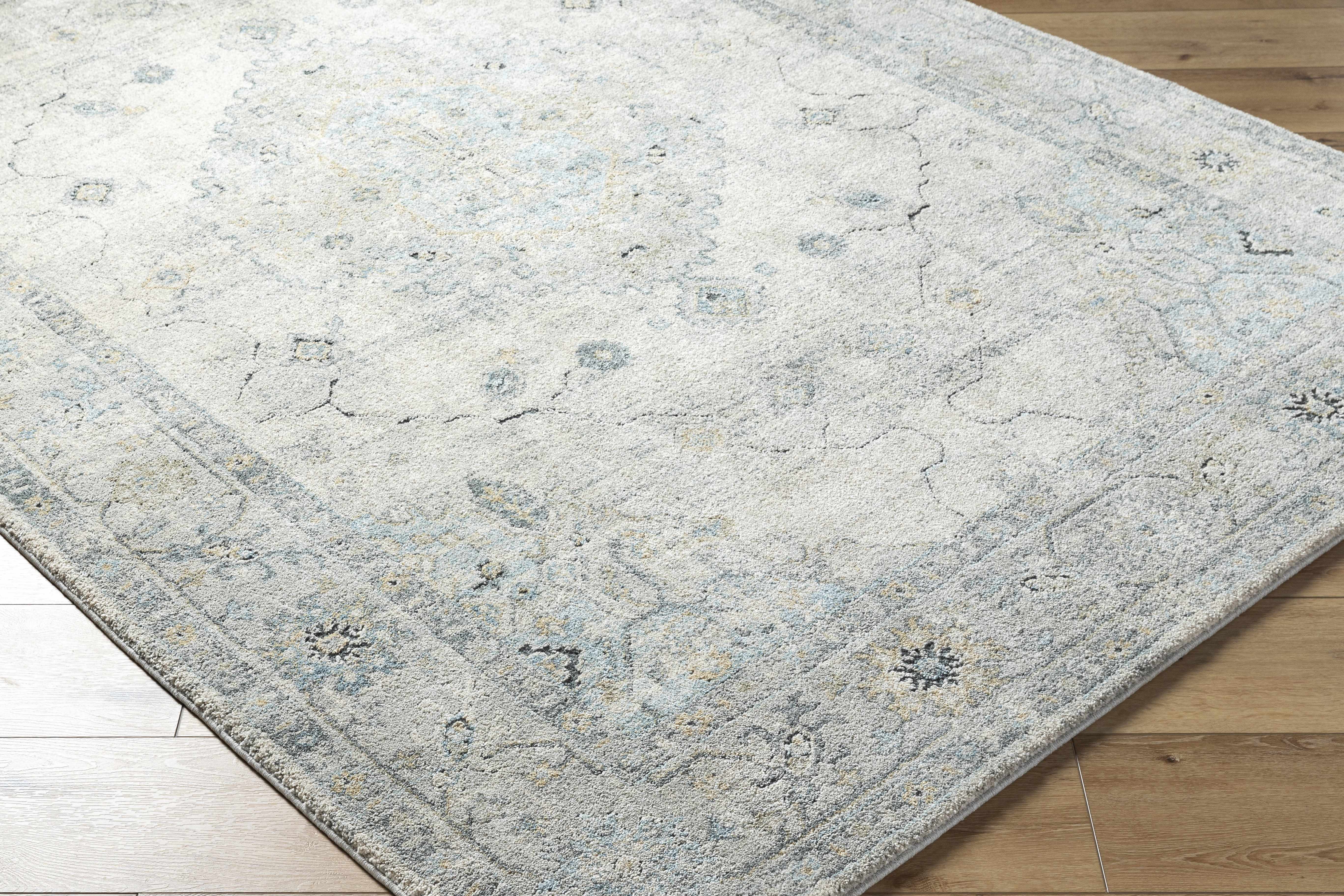 Tyche Area Rug