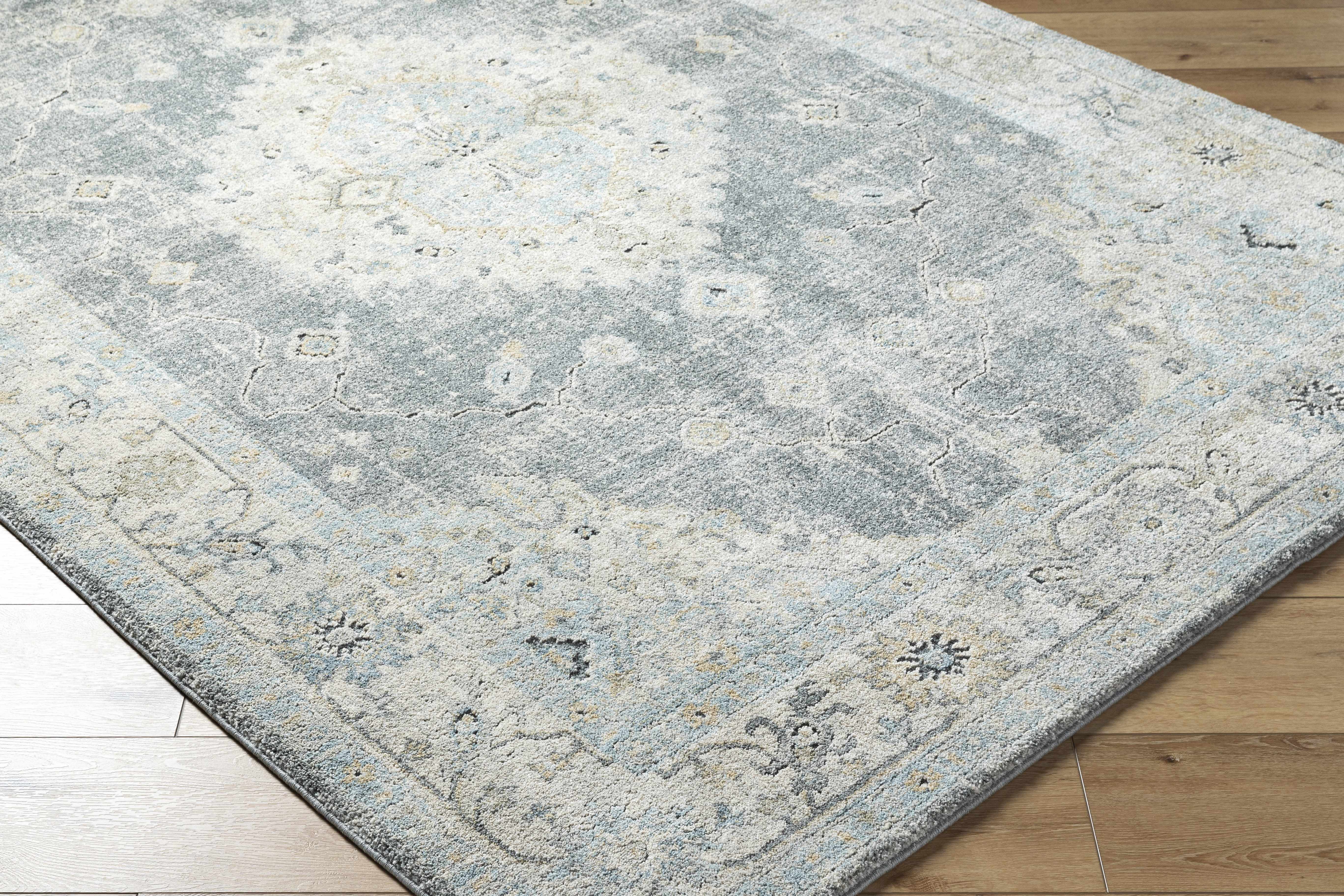 Tyche Area Rug
